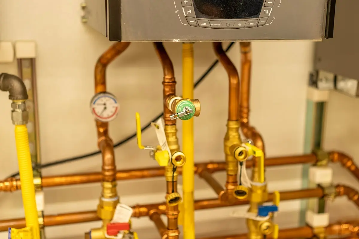 Licensed technician providing Slab Leak Repair for a homeowner in Le Claire